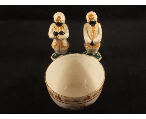 A Grimwades WWI 'Ole Bill' pottery bowl, after Bruce Bairnsfather and an unusual pair of American pottery novelty salt and pe
