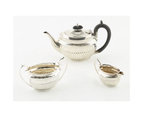 A Victorian bachelor's three piece tea serviceWalker and Hall, Sheffield 1886, comprising, teapot, two handled sugar basin an