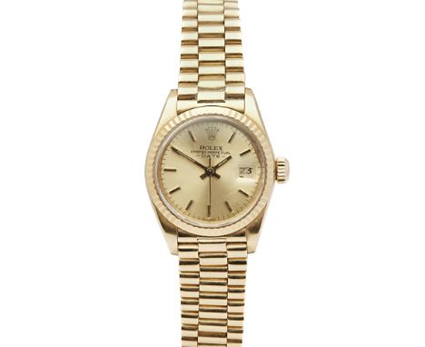 ROLEX - A lady's 18ct gold wrist watchOyster Perpetual Date, gilt Roman numerals and hands, sweep second hand, screw down cro