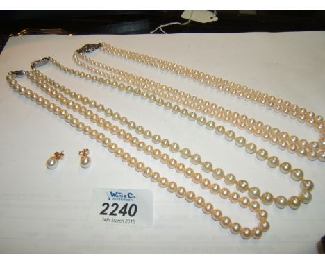 Three simulated pearl Necklaces and a pair of 9ct gold pearl Earrings