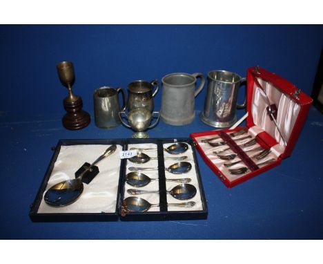 A quantity of Plate and Pewter Tankards and Trophies, a boxed Epns Cake fork set and a boxed Epns fruit spoon set.