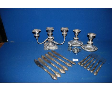 A quantity of silver Plated items including a pair of candlesticks, 5" high, three light candelabra, six fish knives, six des