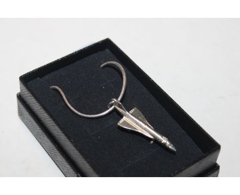 A vintage Sterling silver necklace with Concorde pendant (Concorde has hinged nose)