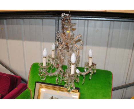 A French glass five light chandelier with prism drops