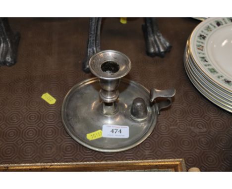 A silver plated chamber stick