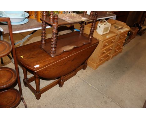 An oak gate leg coffee table 