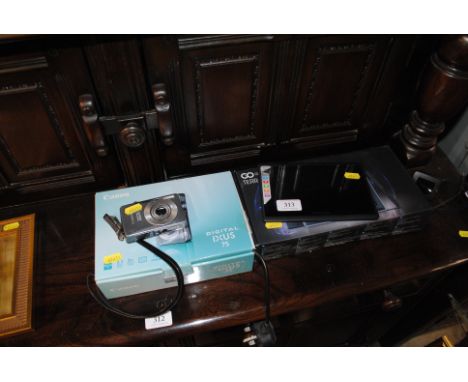 A Canon Digital IXUS 75 camera and a Goclever tablet