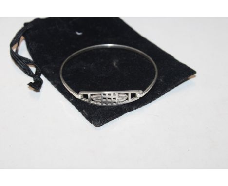 A Hallmarked Macintosh style front opening bangle 