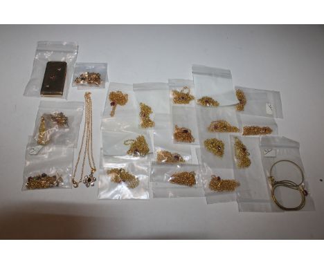 Ex-jewellers stock collection of gold tone ruby necklaces, other gem set earrings, gold tone ruby and diamond money clip