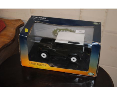 A boxed 1;18 scale model Land Rover Defender 90 hardtop