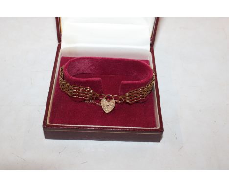 A 9ct gold gate link bracelet with padlock clasp, 10.5gms 