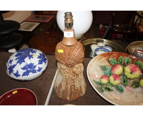 A Bernard Rooke pottery table lamp with raised leaf and insect decoration