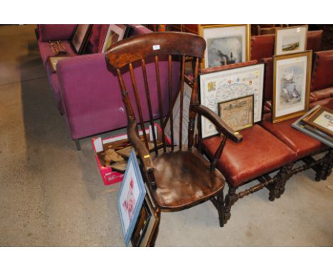 An elm seated stick back elbow chair 