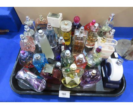 A collection of mainly ladies perfume, mostly testers including Jean Paul Gaultier, Juicy Couture, Brittany Spears, Michael K