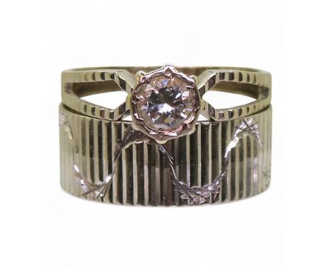 A retro wedding set, comprising of a wide 18ct white gold engraved wedding ring hallmarked London 1971, size K1/2, together w