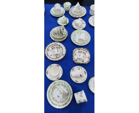 A collection of George Logan designed&nbsp;Peacock Pottery Foley Art China cups and saucers and trios, including pattern numb