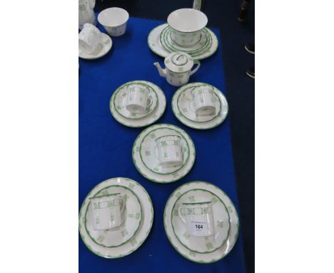 A Peacock Pottery Foley Art China part tea set comprising small teapot, five trios, slop bowl and assorted other plates, desi