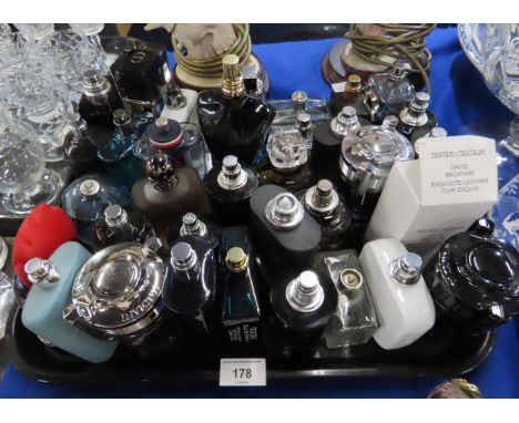 A collection of mainly men's aftershaves, mostly testers including Gucci, Police, Davidoff, Versace, Georgio Armani, Dior, Je