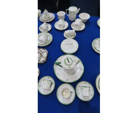 A Peacock Pottery Foley Art China part tea set comprising coffee pot, two small coffee cups and a saucer, two larger cups and