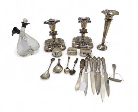 A set of six Art Nouveau white metal fruit knives, with stylised handles (one missing handle), a silver mounted double oil bo