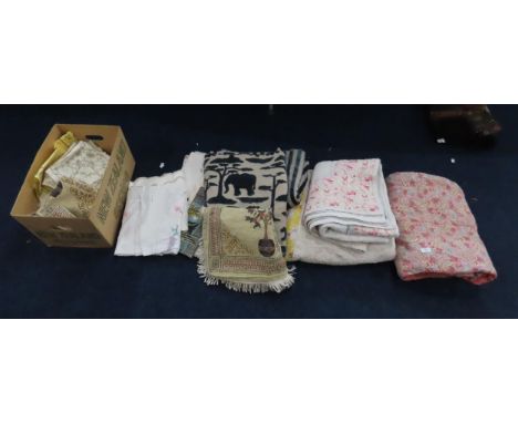 A Comfy quilt, two other quilts, velour fabric with elephants and tigers and a further stripped piece, assorted table linen e