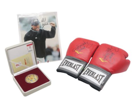 A pair of Everlast 12oz boxing gloves signed by Manny Pacquiao; together with a cased 2008 Beijing Olympics&nbsp;Harmonious O