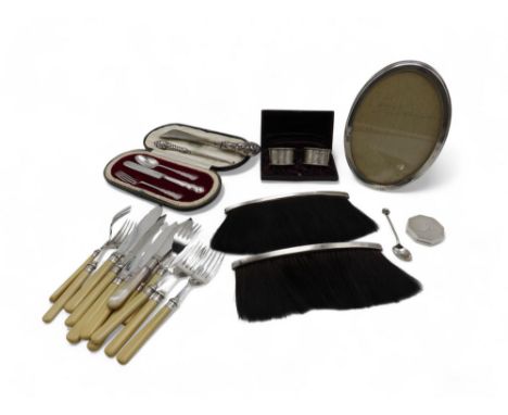 A silver crumb brush, by Adie Brothers Ltd, Birmingham, a Scottish silver example, by Brook &amp; Son, Edinburgh, a silver-mo