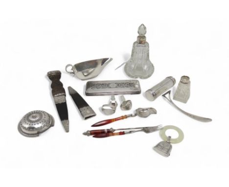 A collection of silver including a Georgian silver box lid, a silver shaving brush pot, a sterling silver hardstone baby ratt