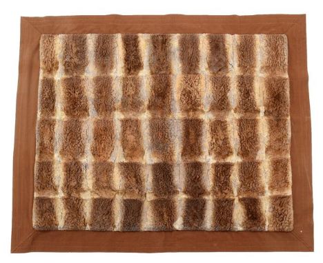 Pelts/Hides: An Early 20th Century Duck Billed Platypus Patchwork Carriage Rug, the overall construction formed by forty five