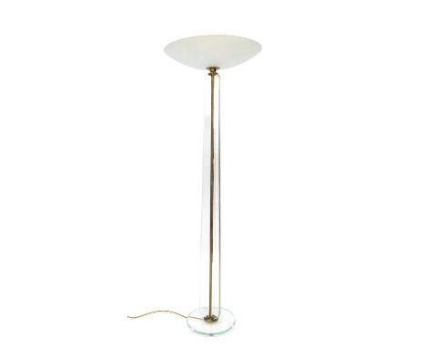 A stylish Art Deco uplighter torchiere floor lamp in the manner of Jean Perzel, with glass base and column comprised of three