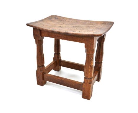 A Robert Thompson of Kilburn, Mouseman oak and burr oak stool, the dish top seat on octagonal legs, with the mouse motif to l