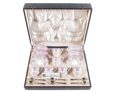 Royal Worcester cased coffee set, fitted out with six silver spoons bearing dates 1935, the Worcester pieces bearing date sta