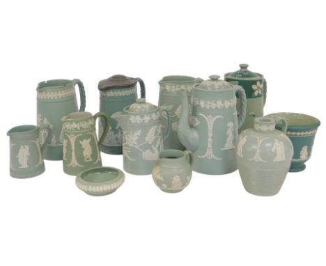 A group of Dudson Brothers green sprig moulded jugs and pots, including a coffee pot, hot water jug, and other pieces, some u