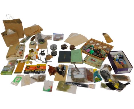 A group of fishing tackle, to include various reels, two wooden examples, a Rimfly Magnum, artificial raphia, Intrepid spare 