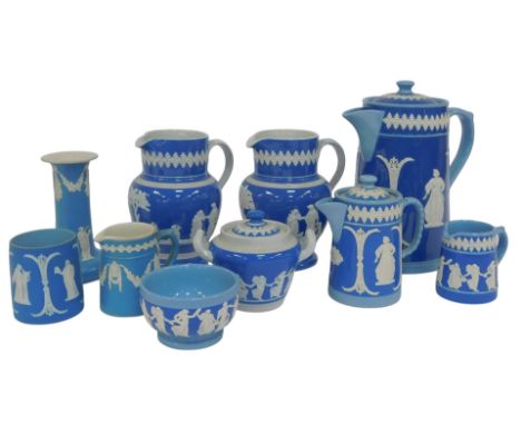 A group of Dudson Brothers blue sprig moulded jugs and bowls, etc., including a large lidded jug, 23cm high, a pair of jugs, 