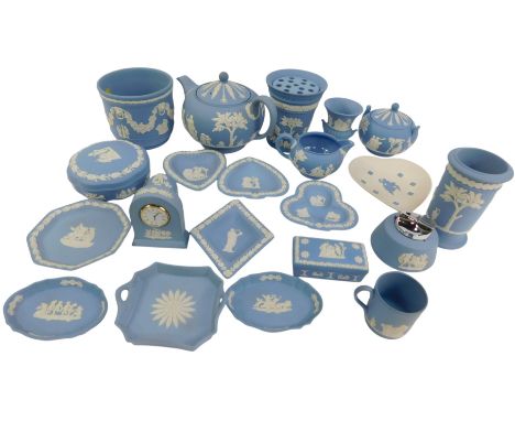 A group of Wedgwood blue Jasperware, to include a table lighter, teapot, mantel clock, jardiniere, trinket dishes, etc. (1 tr