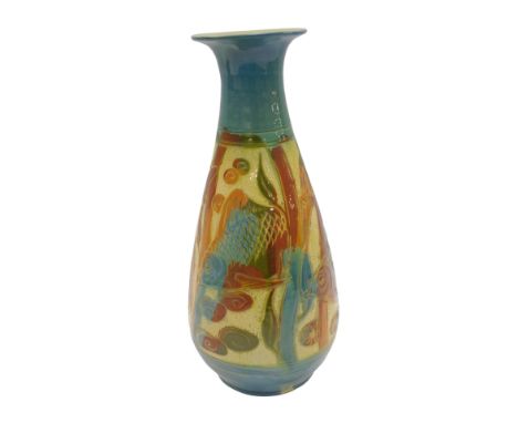 A late 19thC Brannam Barum pottery vase, sgrafitto decorated with a band of fishes and river plant life, against a blue groun