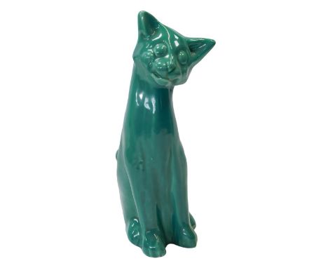 A CA Brannam of Barnstaple pottery figure, modelled as a cat in seated position, turquoise glaze, impress marks, 26cm high. 