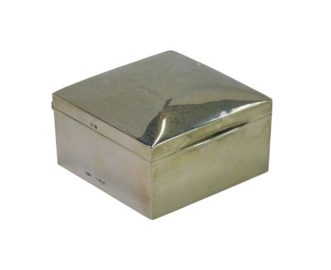 A George V silver cigarette box, of plain form, the hinged lid enclosing a treen lined interior, William Hare Haseler, Birmin
