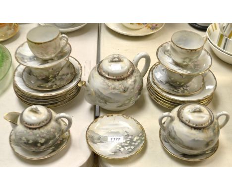 A Japanese 25 piece tea service, Views of Mount Fuji