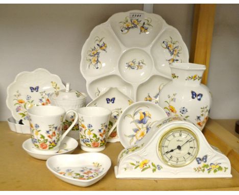 An Aynsley Just Orchids pattern hors d'oeuvre dish; a Cottage Garden pattern desk clock similar; others, preserve pot, trinke