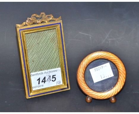 Two gilt and enamel photograph frames