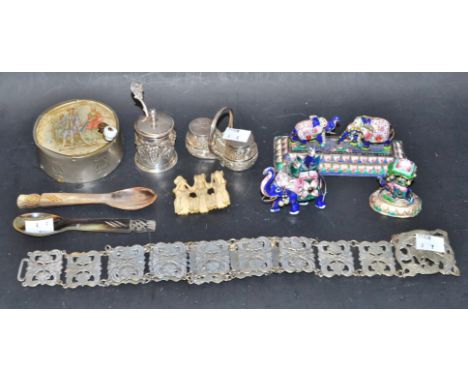 An EPNS nurse's belt and buckle; a silver coloured metal mustard pot and spoon, glass liner; a silver coloured metal salt and