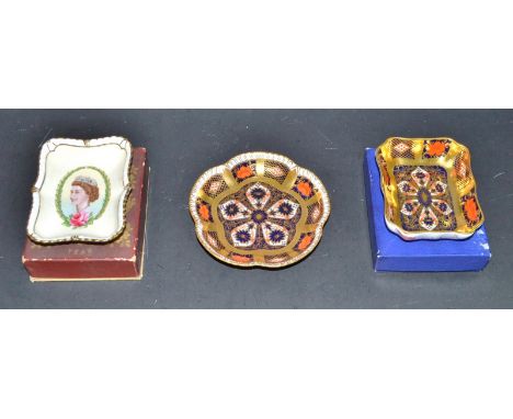 A Royal Crown Derby 1128 pattern solid gold band trinket dish, boxed; an other five petal dish; a coronation 1953 pin dish, b