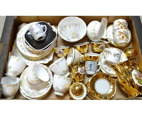Teaware - a Tuscan china plant pattern six setting tea service comprising teacups, saucers, tea plates, bread plate, milk jug