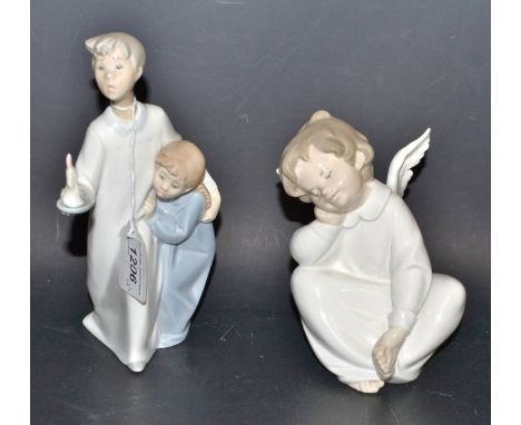 A Lladro figure, Sleeping Cherub, printed and impressed marks; another, Candle Light Walk (2)