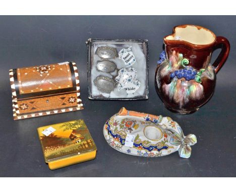 A tin glazed desk stand; a marquetry inlaid domed box and cover; ceramic and metal decanter labels, Sherry, Brandy, Gin, Whis
