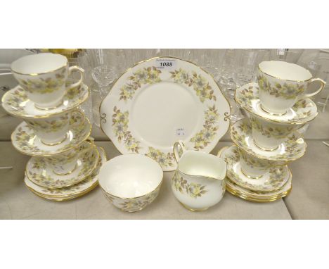 A Duchess Helena pattern tea service for six, comprising bread and butter plate, side plates, cream jug, sugar bowl, cups and