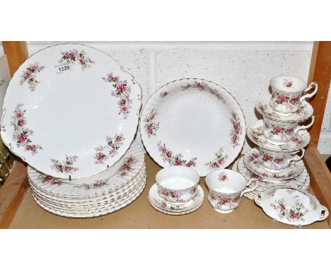 A Royal Albert Lavender Rose part dinner and tea service comprising dinner plates, bread and butter plates, service dish, sid