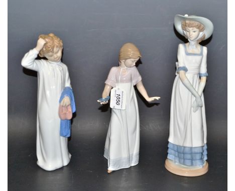 A Nao figure of boy retiring to bed; others, a girl holding a candle stick, a lady in a bonnet (3)